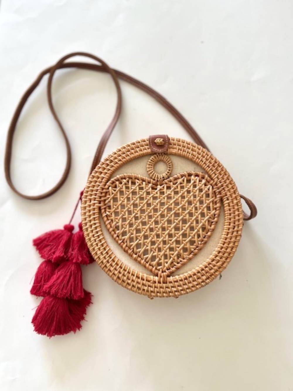Handcrafted Round Rattan Crossbody Bag with Woven Heart
